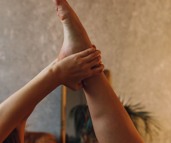 Person feeling energetic and mobile after daily yoga habit